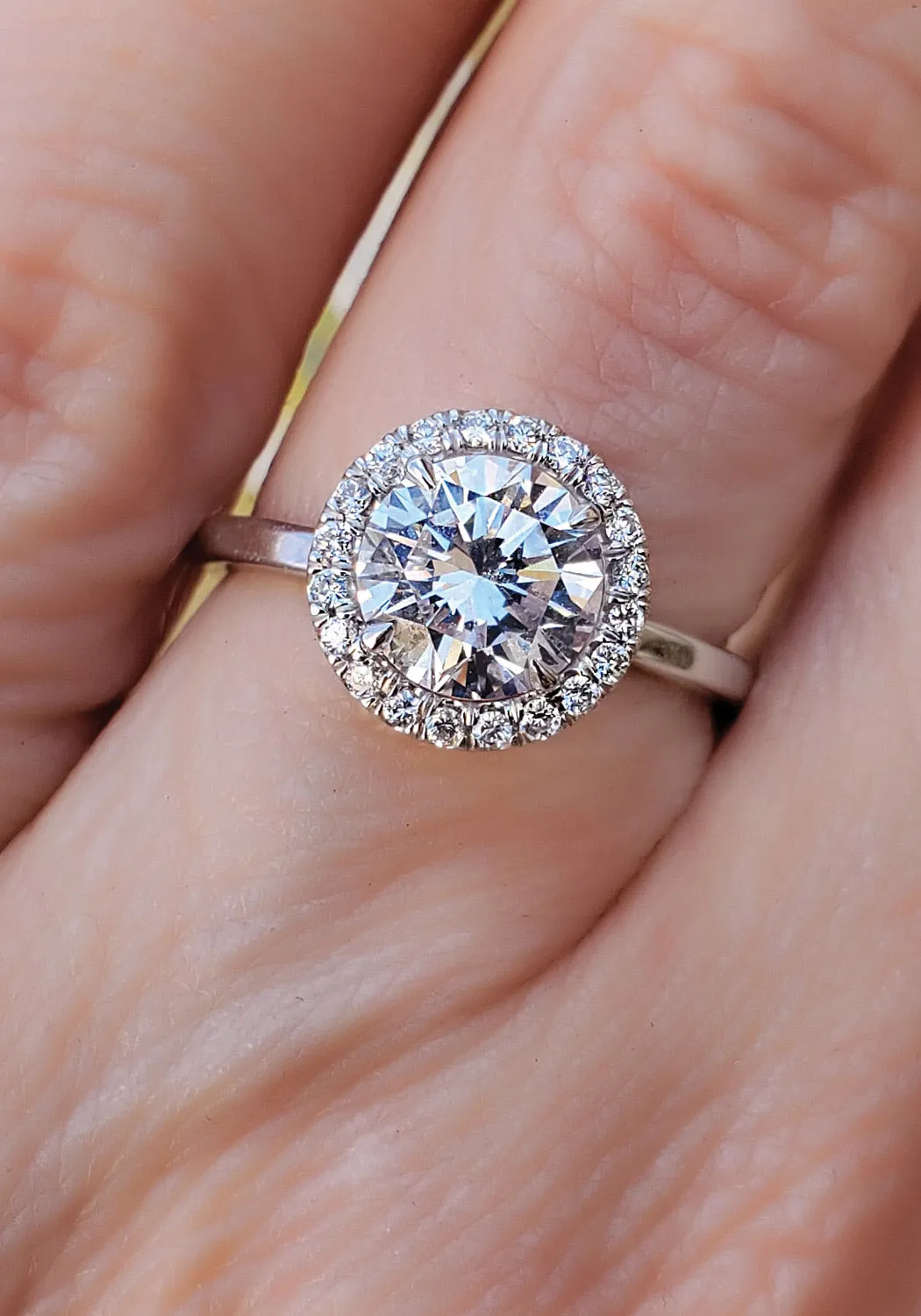 Oster Collection Platinum Halo Round Diamond Ring